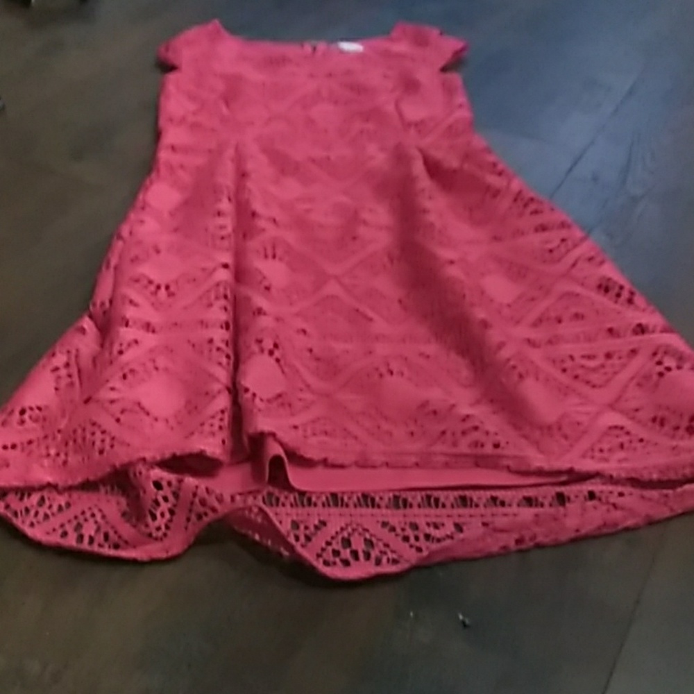 Pink with designs and zipper in the back